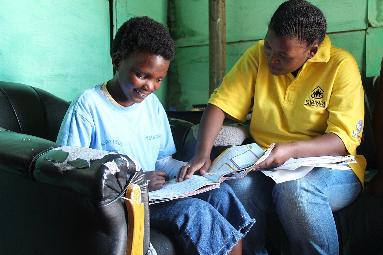 Young adults engaged in work within their community