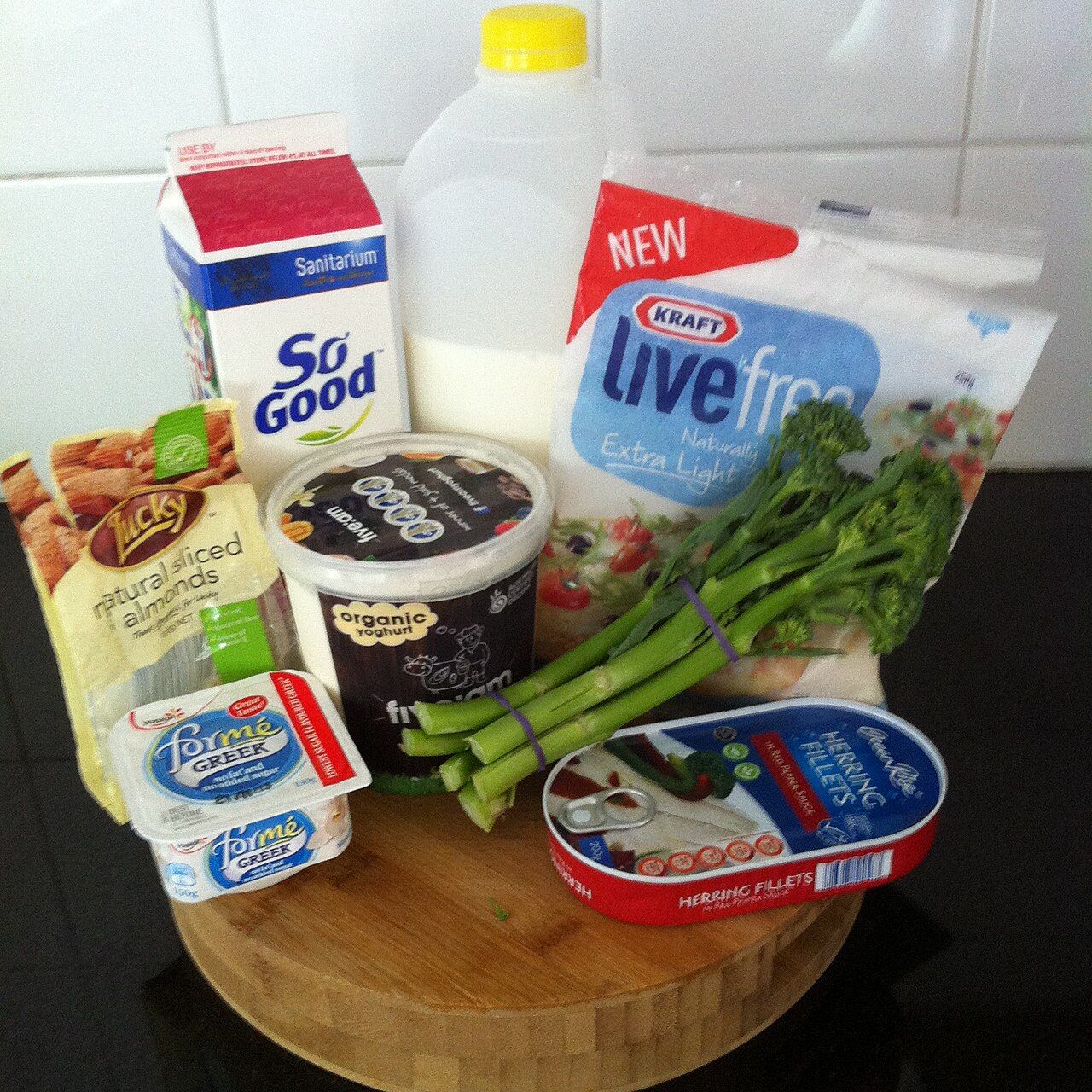 A range of calcium-rich foods including dairy, greens, and fortified products