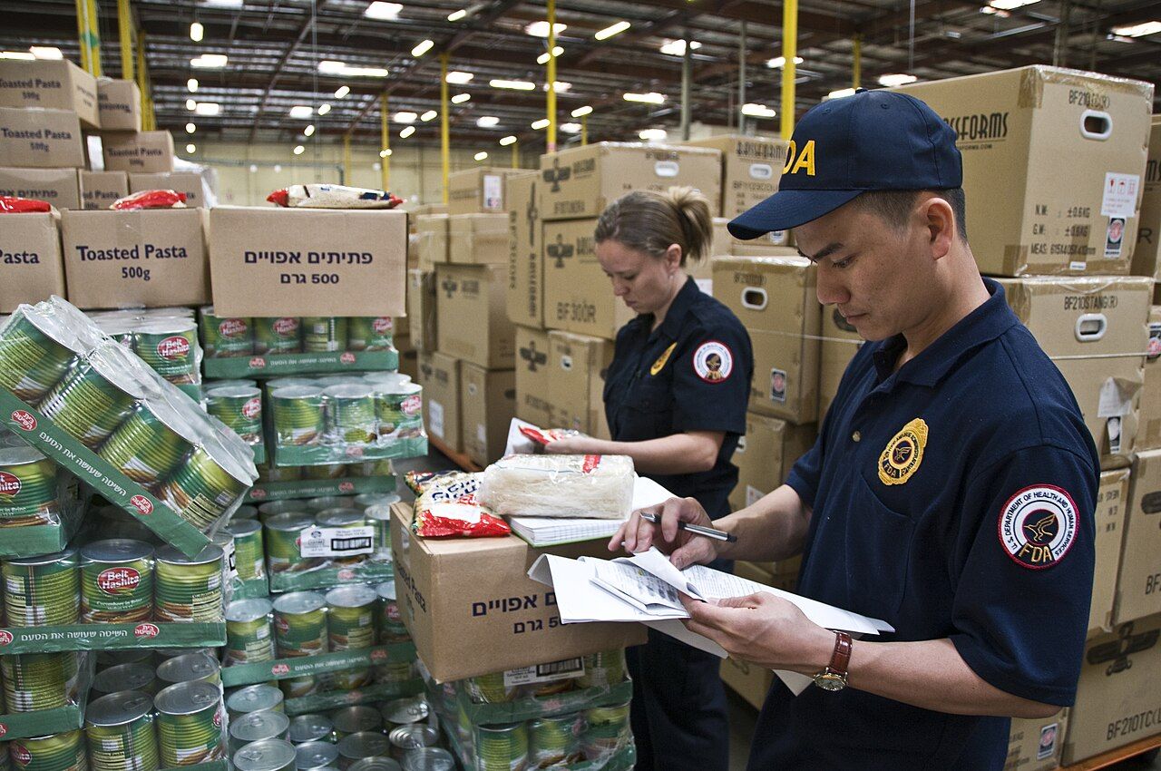 A food inspector examining products in a facility