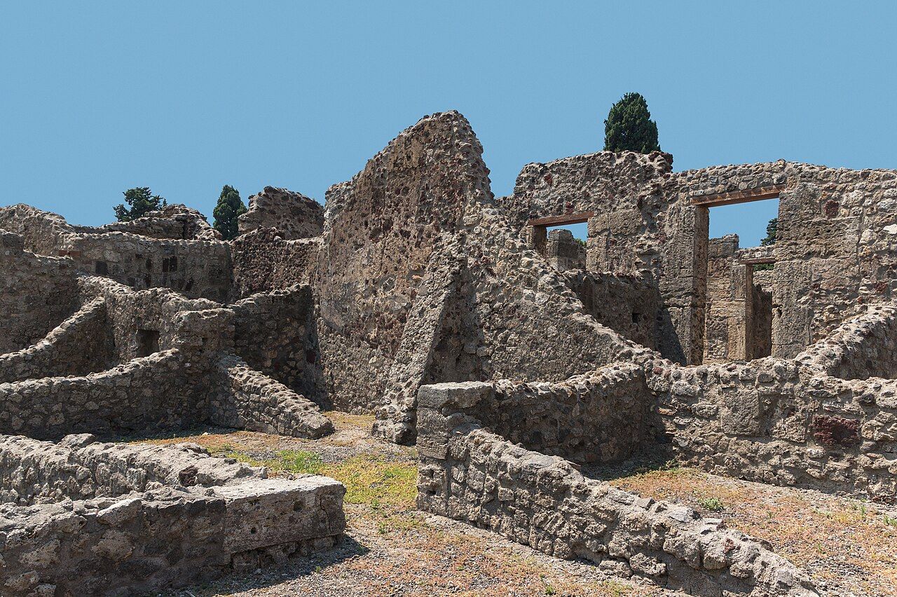 Roman mosaic from Pompeii showing Plato seated with students beneath a tree, the Acropolis in the background