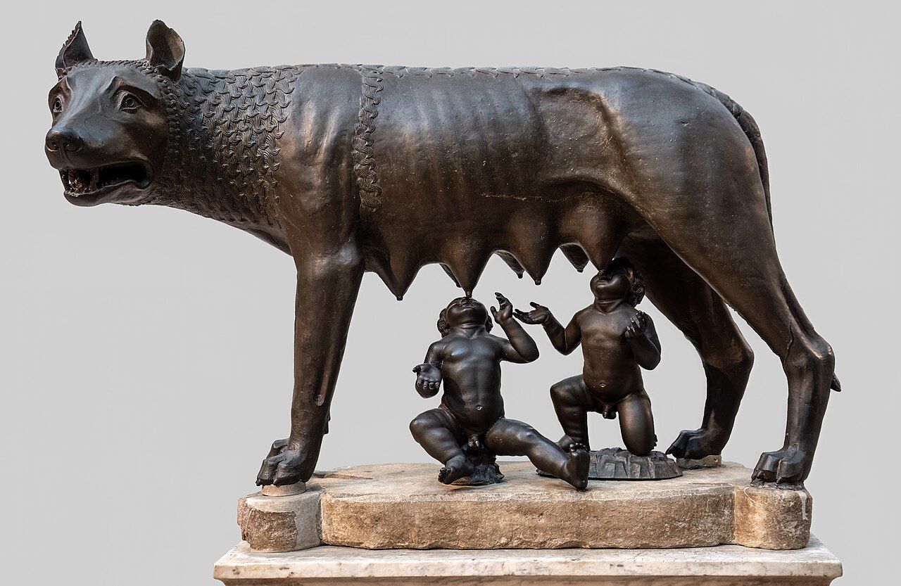 The Capitoline Wolf, a bronze she-wolf statue suckling the infant twins Romulus and Remus, displayed in the Capitoline Museums in Rome
