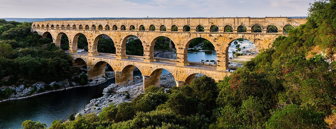 The Pont du Gard in southern France carried water some fifty kilometers to Nemausus and shows the engineering that made Roman urban life possible.